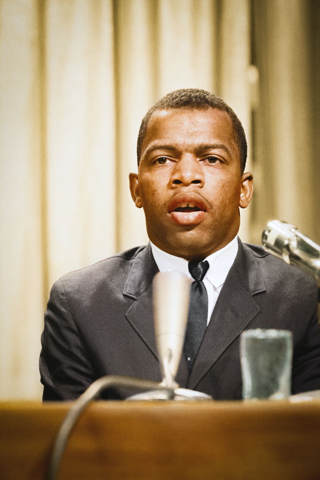 Caption reads,  John Lewis speaks at a meeting of American Society of Newspaper Editors in Washington D.C.
