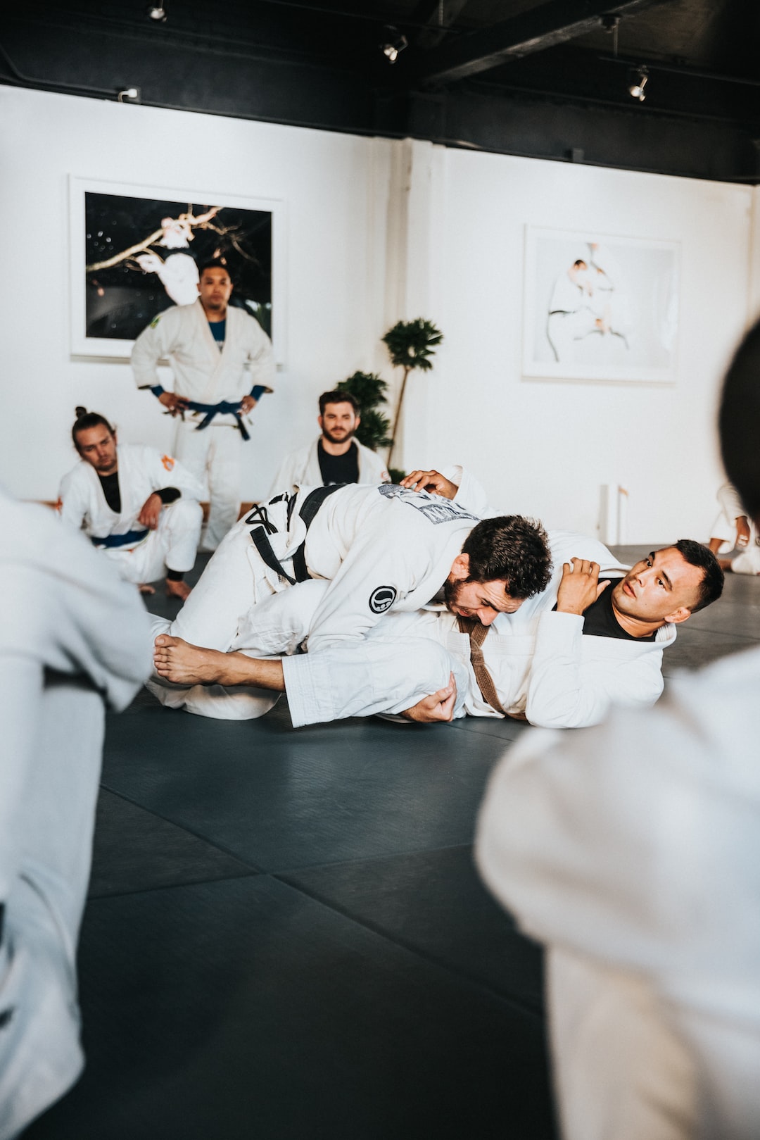group of men in white karate gi