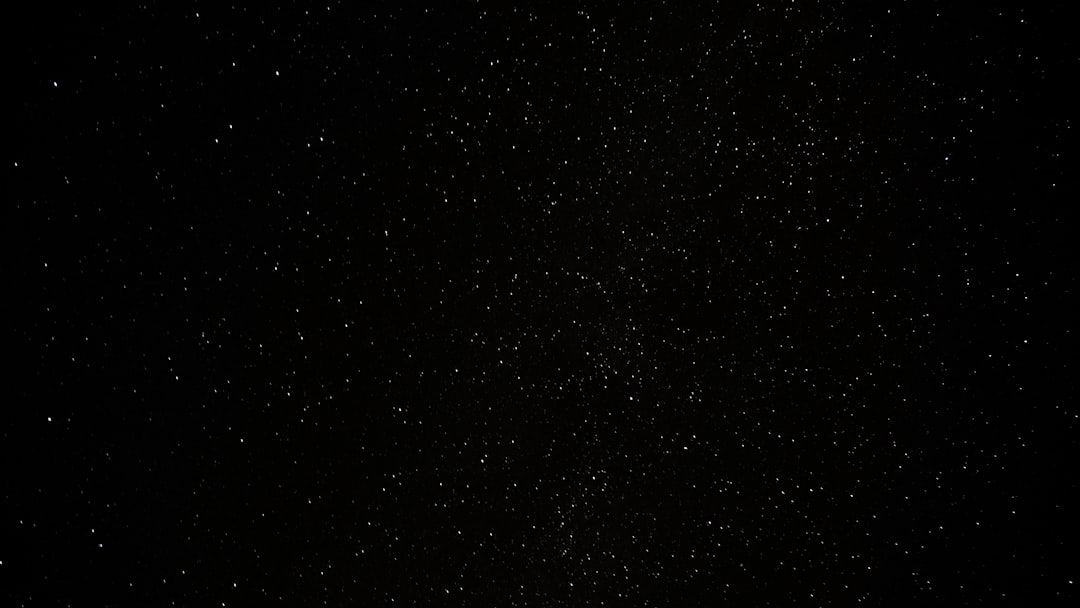 a black sky with a lot of stars
