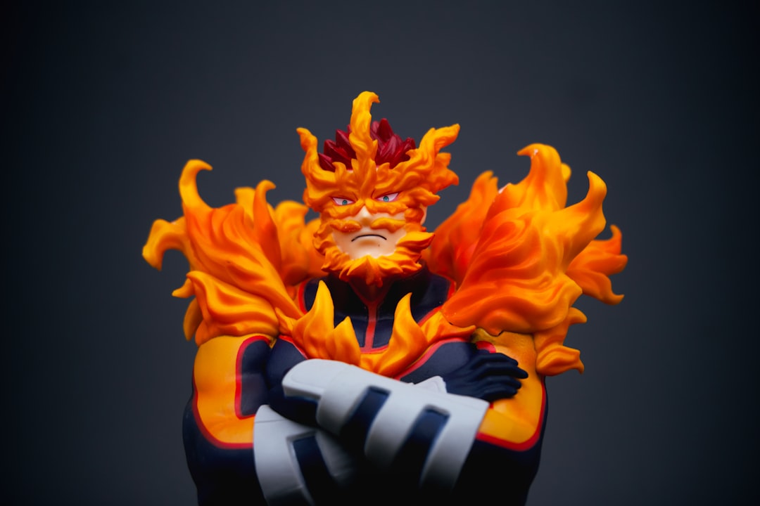 Endeavor action figure from My Hero Academia by MMA Ninja a close up of a figurine of a person with fire on his face